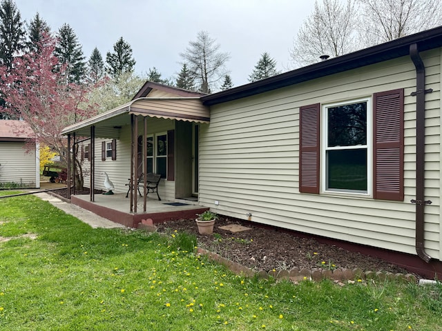 exterior space with a yard