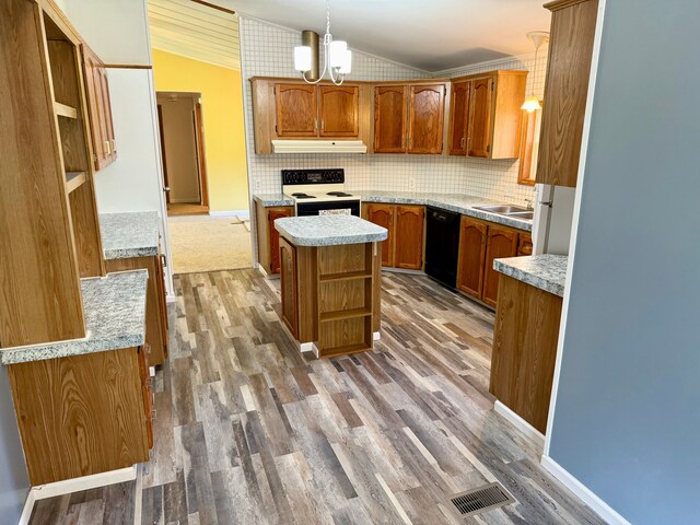 kitchen with open shelves, electric range oven, a chandelier, lofted ceiling, and under cabinet range hood
