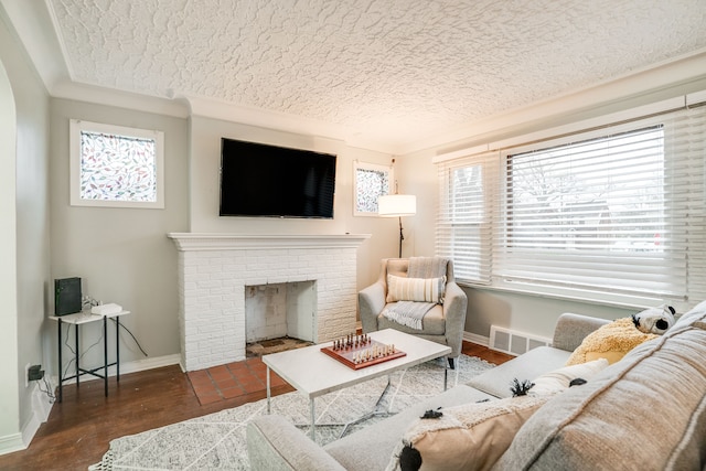 17215 Warrington Dr, Detroit, MI 48221 - living area with visible vents, baseboards, a textured ceiling, and wood finished floors