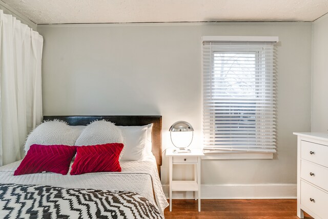 17215 Warrington Dr, Detroit, MI 48221 - bedroom with baseboards and wood finished floors