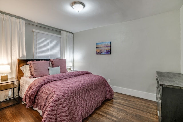 17215 Warrington Dr, Detroit, MI 48221 - bedroom with baseboards and dark wood-type flooring