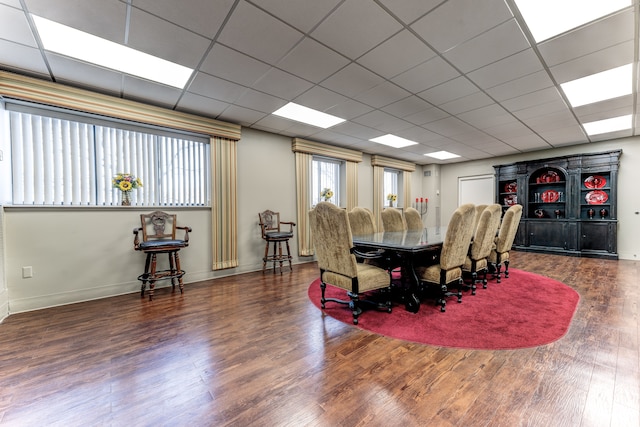 21800 Morley Ave Unit 619, Dearborn, MI 48124 - dining space featuring a paneled ceiling, baseboards, and wood finished floors
