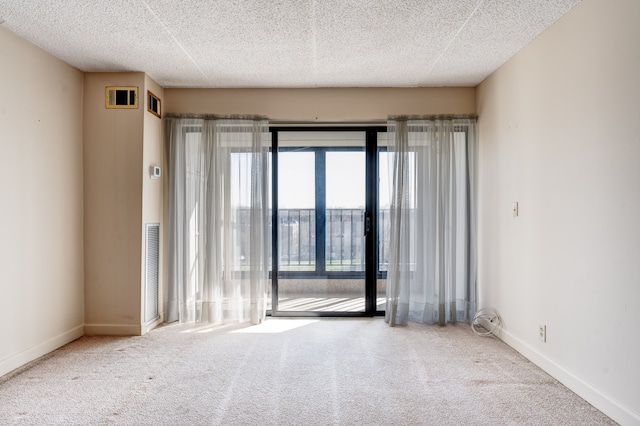21800 Morley Ave Unit 619, Dearborn, MI 48124 - carpeted empty room featuring baseboards and a textured ceiling