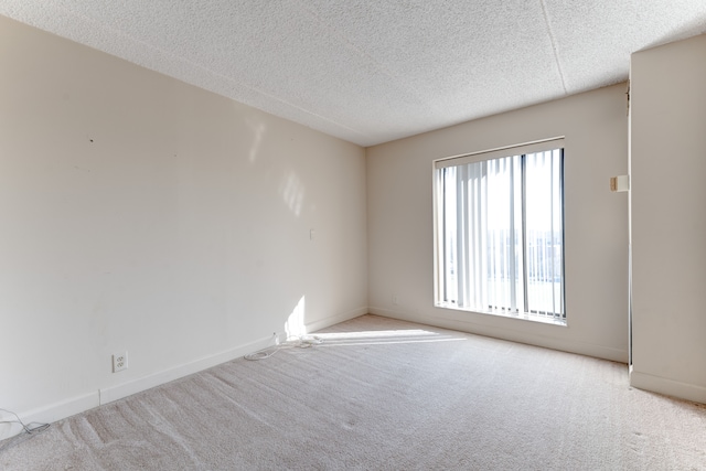 21800 Morley Ave Unit 619, Dearborn, MI 48124 - carpeted spare room with a textured ceiling and baseboards