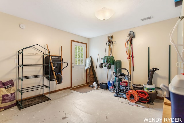 interior space with baseboards and visible vents
