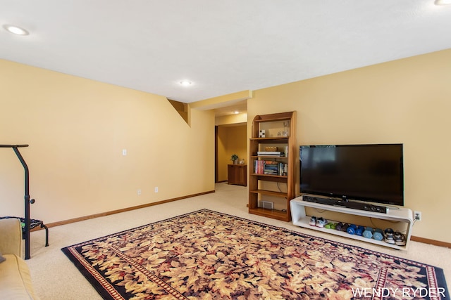 carpeted living room with baseboards and recessed lighting