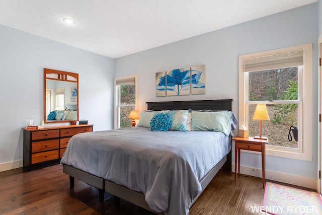 bedroom featuring baseboards, recessed lighting, and dark wood-style flooring