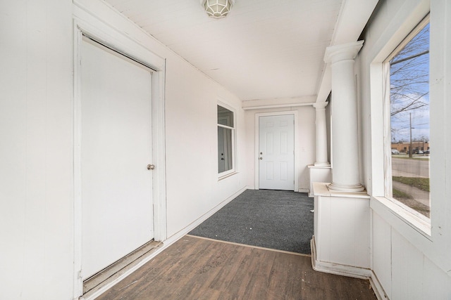 hallway featuring dark wood-style flooring