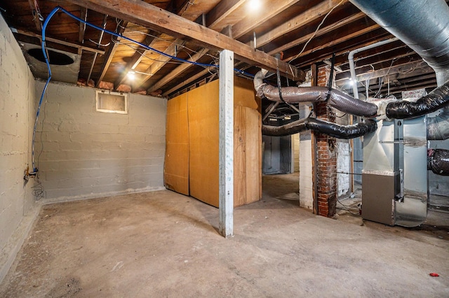 unfinished basement with heating unit