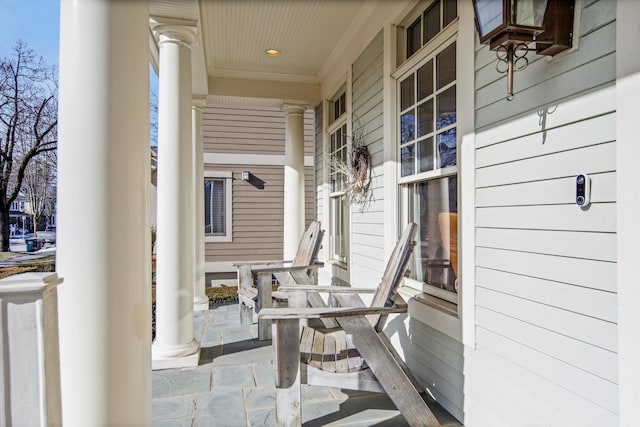 view of patio featuring a porch