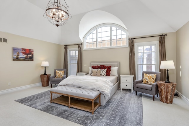 carpeted bedroom featuring high vaulted ceiling, multiple windows, baseboards, and a notable chandelier