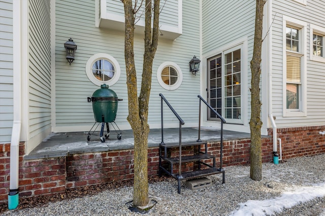 exterior space featuring brick siding