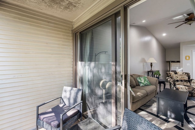 exterior space with a ceiling fan