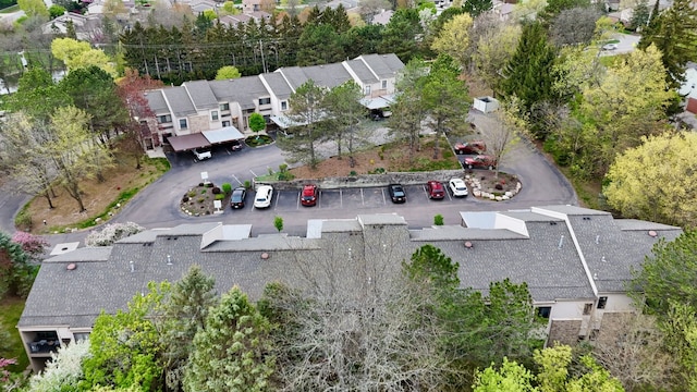 birds eye view of property with a residential view