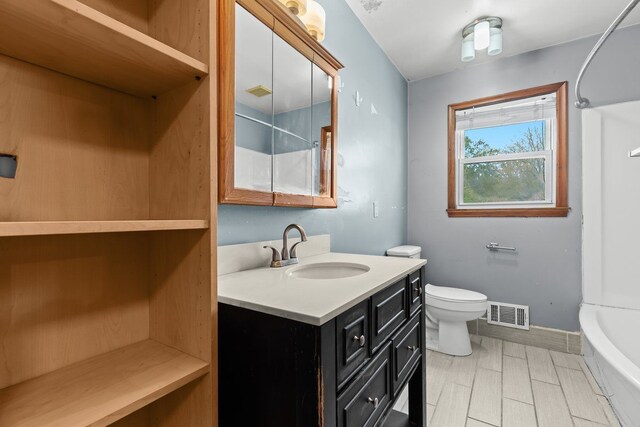 full bath featuring visible vents, baseboards, toilet, and vanity
