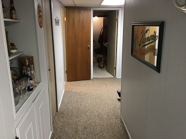 hallway with carpet flooring