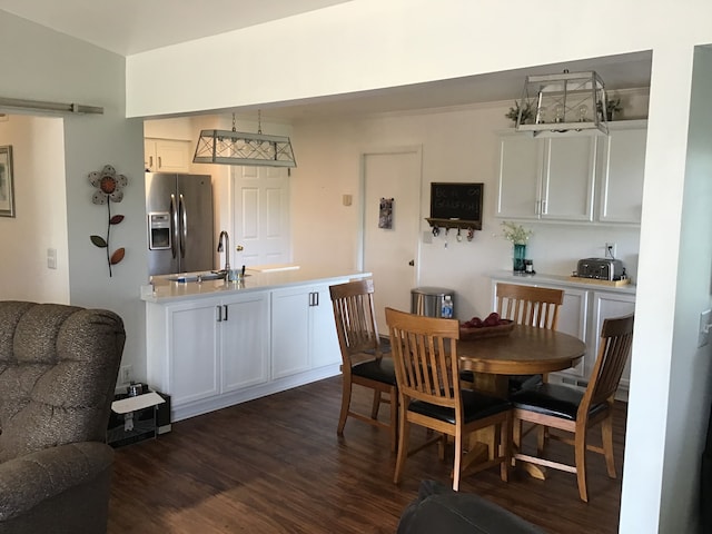 dining room featuring dark wood-type flooring