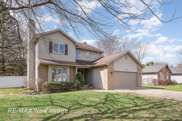 traditional-style house with a garage, fence, a chimney, brick siding, and driveway