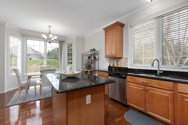 kitchen with a notable chandelier, a sink, dishwasher, dark wood finished floors, and a kitchen island