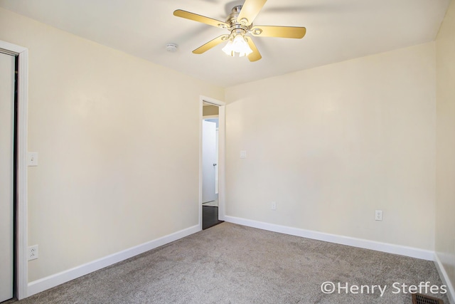 1355 Middle Ln, Battle Creek, MI 49014 - carpeted spare room with a ceiling fan and baseboards