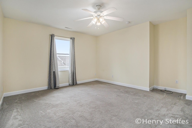 1355 Middle Ln, Battle Creek, MI 49014 - empty room featuring carpet flooring and a ceiling fan