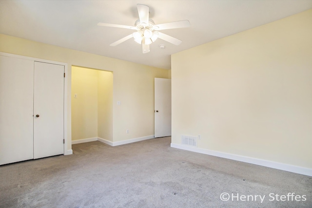 1355 Middle Ln, Battle Creek, MI 49014 - unfurnished bedroom featuring carpet floors and ceiling fan