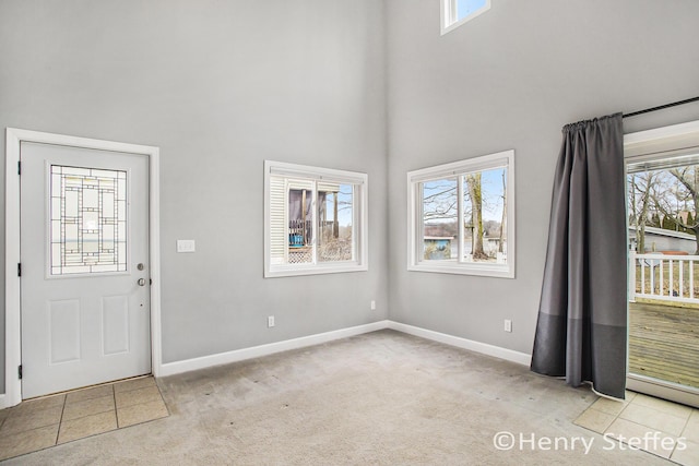 1355 Middle Ln, Battle Creek, MI 49014 - entrance foyer with a high ceiling and light carpet