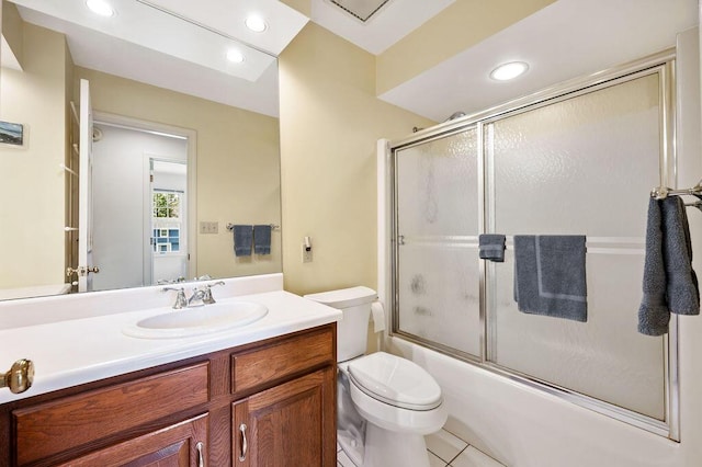 full bathroom with recessed lighting, vanity, toilet, and shower / bath combination with glass door