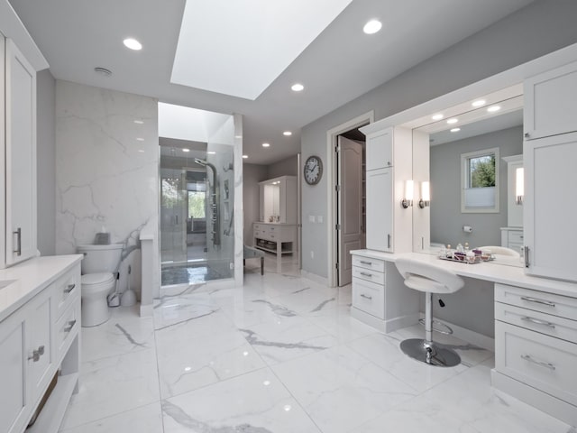 bathroom featuring recessed lighting, toilet, marble finish floor, and a stall shower