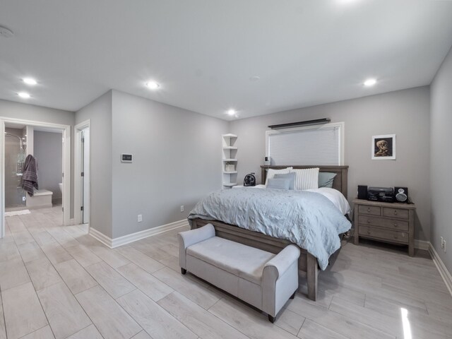 bedroom featuring recessed lighting, baseboards, and light wood-type flooring