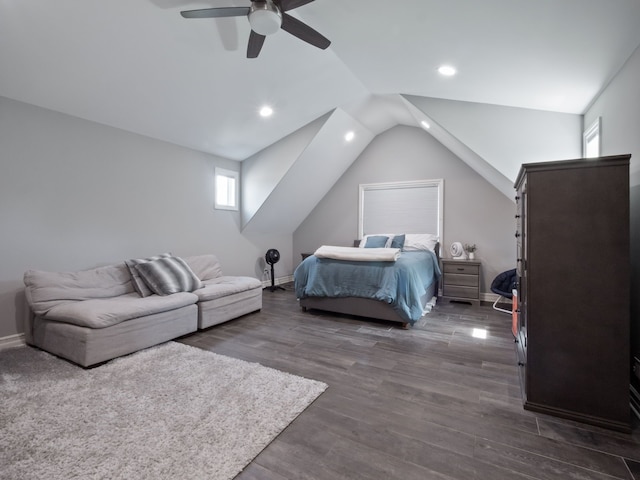 bedroom featuring lofted ceiling, baseboards, ceiling fan, recessed lighting, and dark wood finished floors
