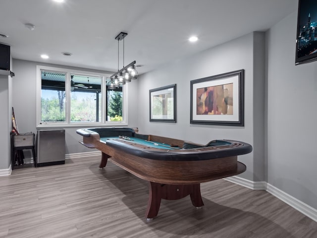 playroom featuring recessed lighting, baseboards, and light wood finished floors