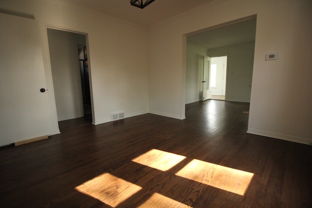 1068 La Salle Ave, Waterford, MI 48328 - spare room with visible vents, wood finished floors, and baseboards