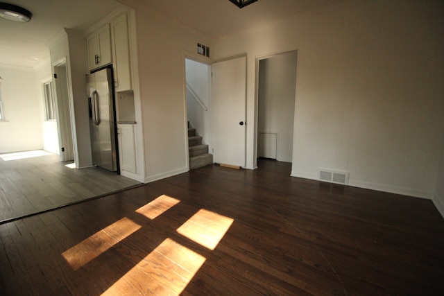 1068 La Salle Ave, Waterford, MI 48328 - empty room with dark wood-style flooring, crown molding, visible vents, and stairway