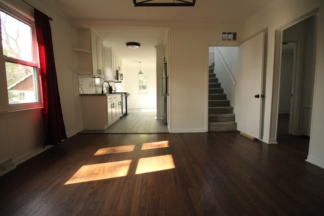 1068 La Salle Ave, Waterford, MI 48328 - corridor featuring stairs, baseboards, dark wood-type flooring, and visible vents