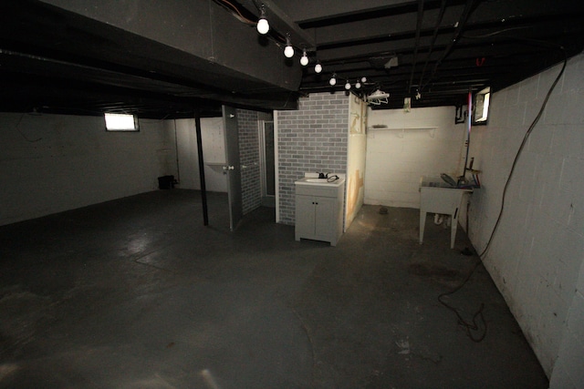 1068 La Salle Ave, Waterford, MI 48328 - unfinished basement with concrete block wall and a sink