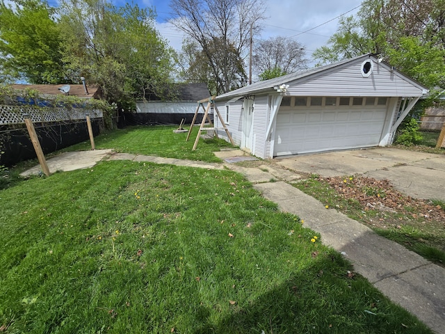 1068 La Salle Ave, Waterford, MI 48328 - view of yard featuring fence, a garage, and an outbuilding