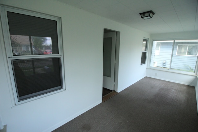 1068 La Salle Ave, Waterford, MI 48328 - unfurnished room featuring baseboards and dark carpet