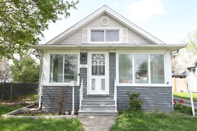 1068 La Salle Ave, Waterford, MI 48328 - view of front of property featuring stone siding and fence
