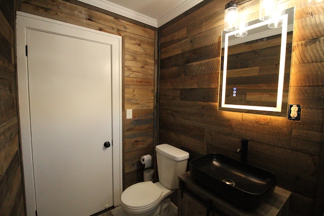1068 La Salle Ave, Waterford, MI 48328 - bathroom with crown molding, toilet, wooden walls, and vanity