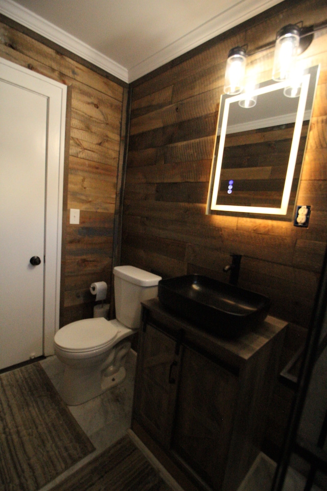 1068 La Salle Ave, Waterford, MI 48328 - half bathroom featuring vanity, wood walls, toilet, and ornamental molding