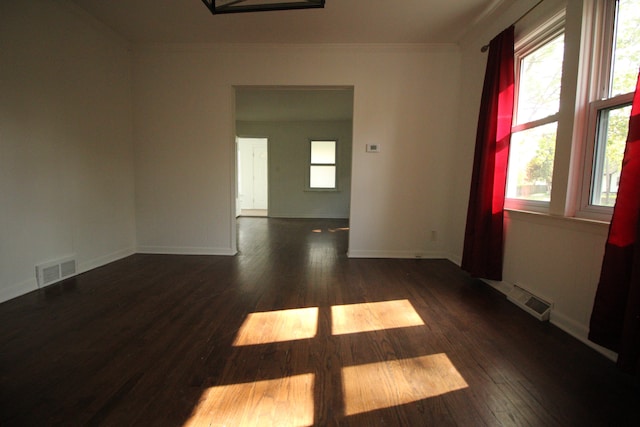 1068 La Salle Ave, Waterford, MI 48328 - empty room featuring crown molding, visible vents, wood finished floors, and baseboards