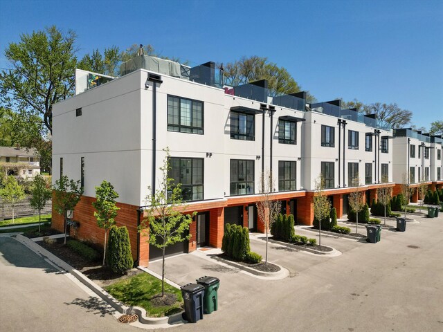 view of building exterior with a residential view