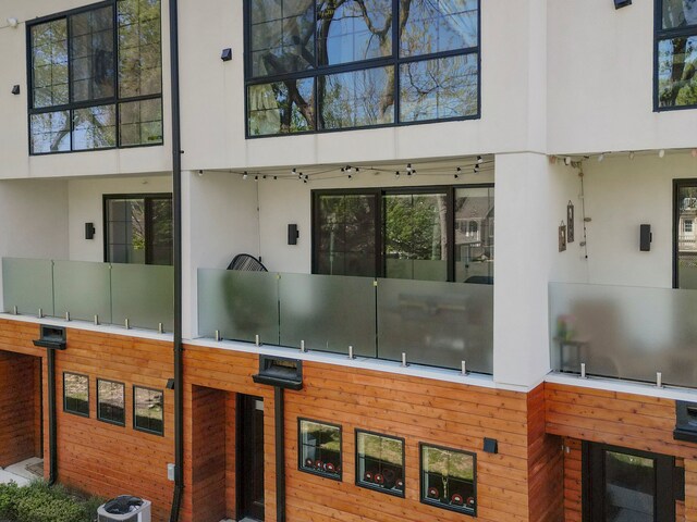 view of building exterior featuring central AC unit
