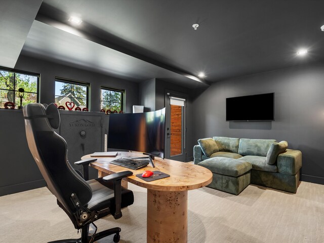 home office featuring recessed lighting, light colored carpet, and a wealth of natural light