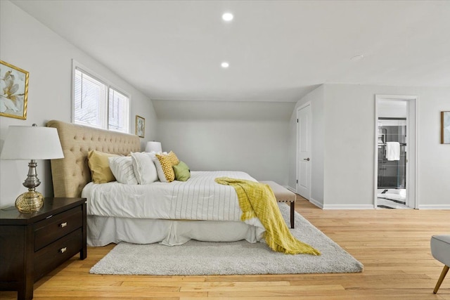 bedroom featuring recessed lighting, baseboards, and light wood-style floors