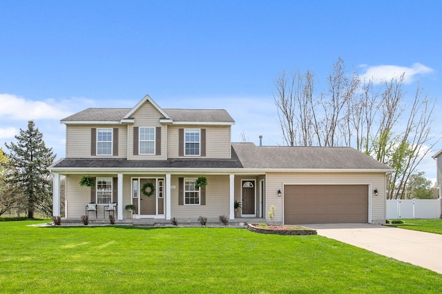 view of front facade with a porch, driveway, a garage, fence, and a front lawn