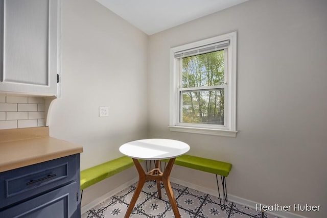 dining space with baseboards