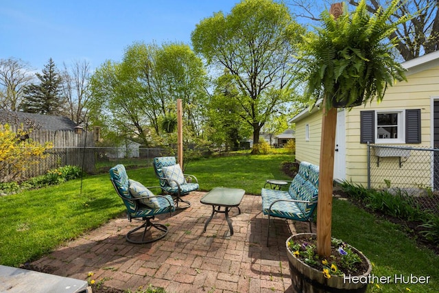 view of patio featuring fence