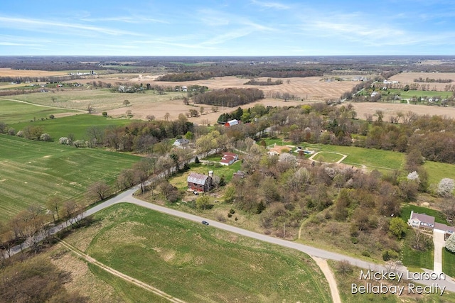 birds eye view of property featuring a rural view
